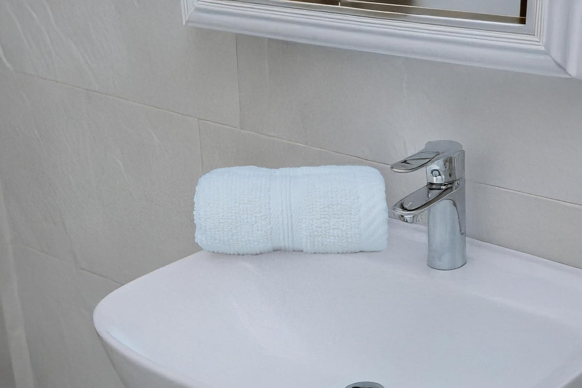 4-Piece Cotton Family Towel Set – Soft & Absorbent | White